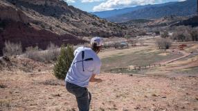 Player on the Fremont Campus Disc Golf Course