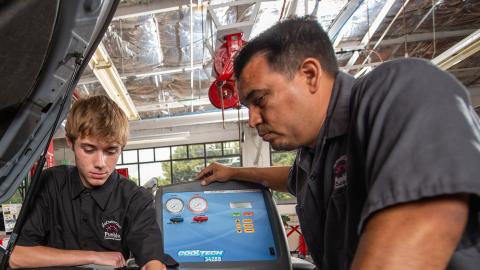 James Cordova with student in PCC's auto body shop