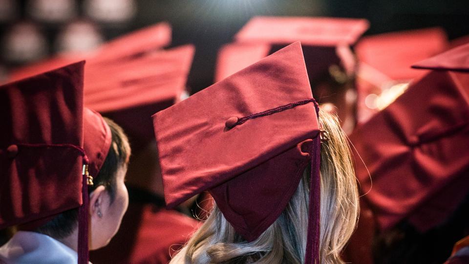 PCC graduates in cap and gown