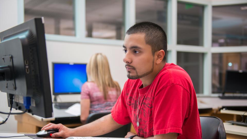 Male student in computer lab