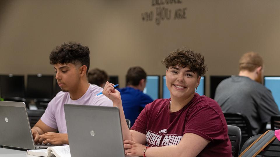 Two Gateway to College students in computer lab