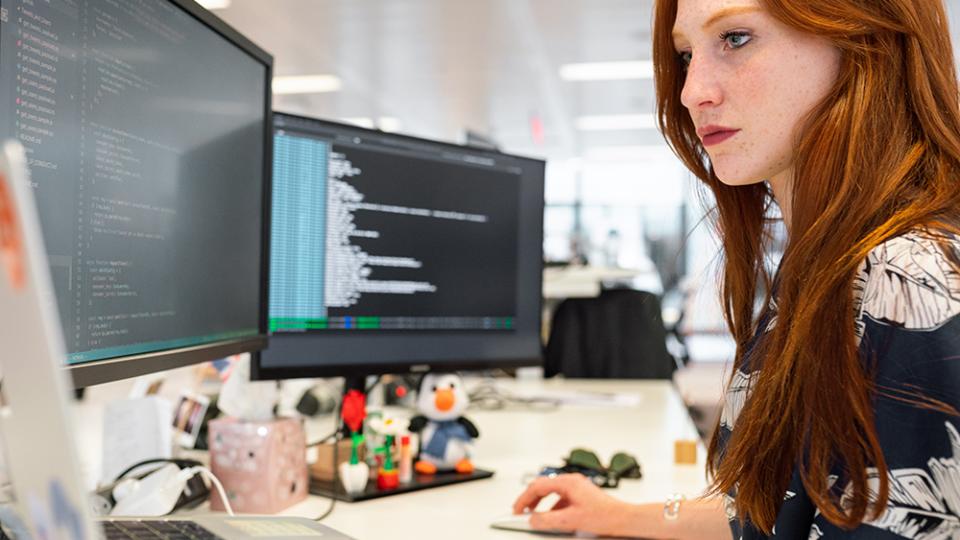 Software Development Card - Woman at computer