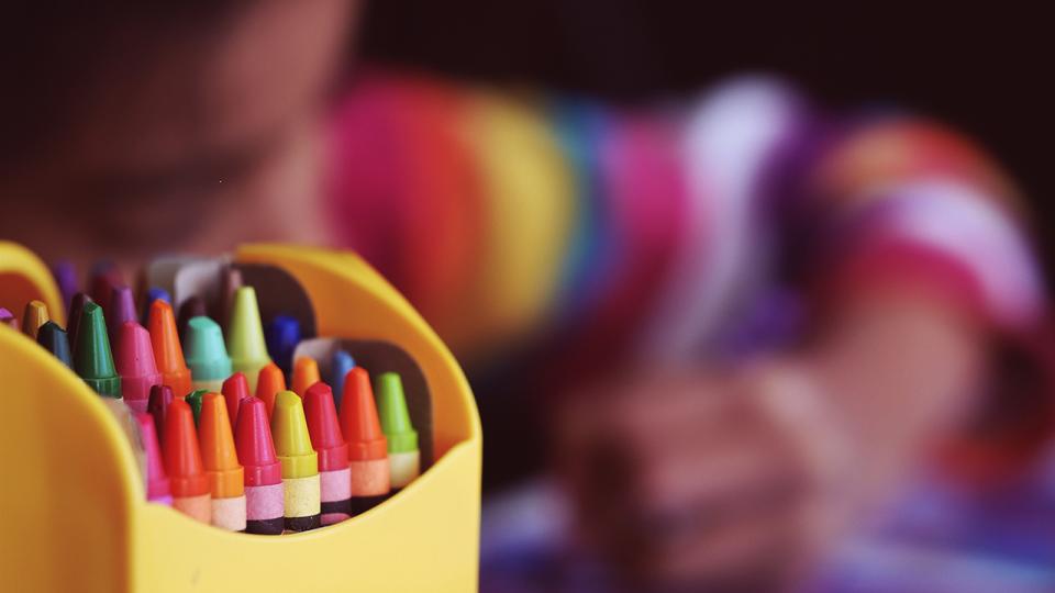 kid and crayons
