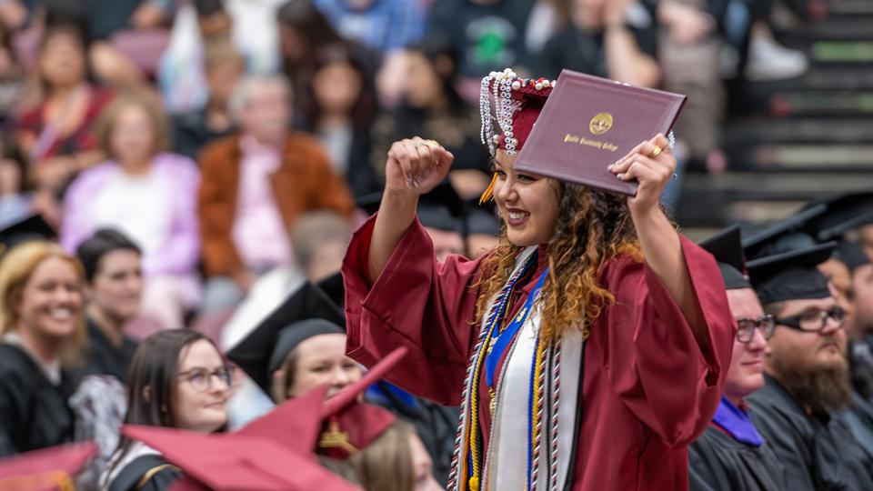 graduate celebrating