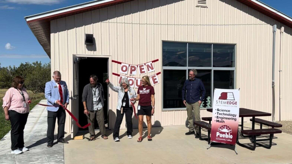 Kevin Aten, Chris LaRose and Melissa Watters cut the ribbon Tuesday morning at Pueblo Community College’s new STEM building. (Cameryn Cass/The Journal)