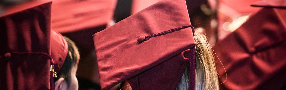 PCC graduates in cap and gown