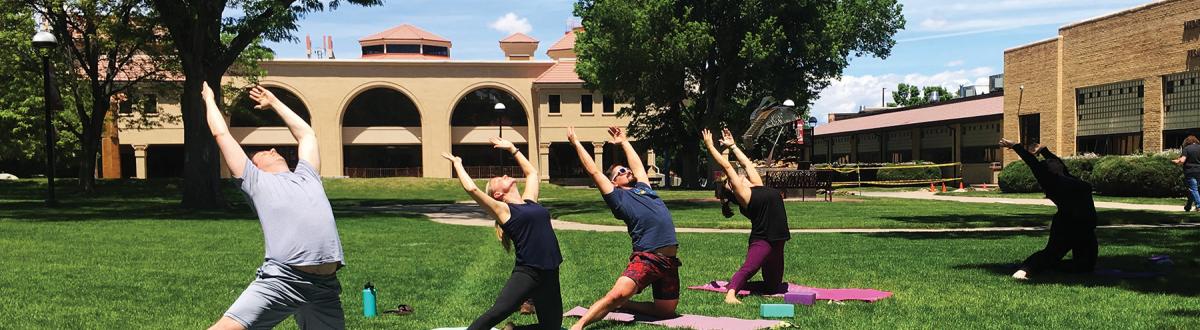 students participating in Yoga in the Courtyard