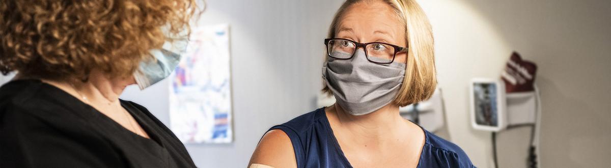 patient and doctor with masks on