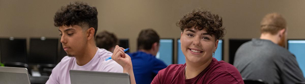 Two Gateway to College students in computer lab