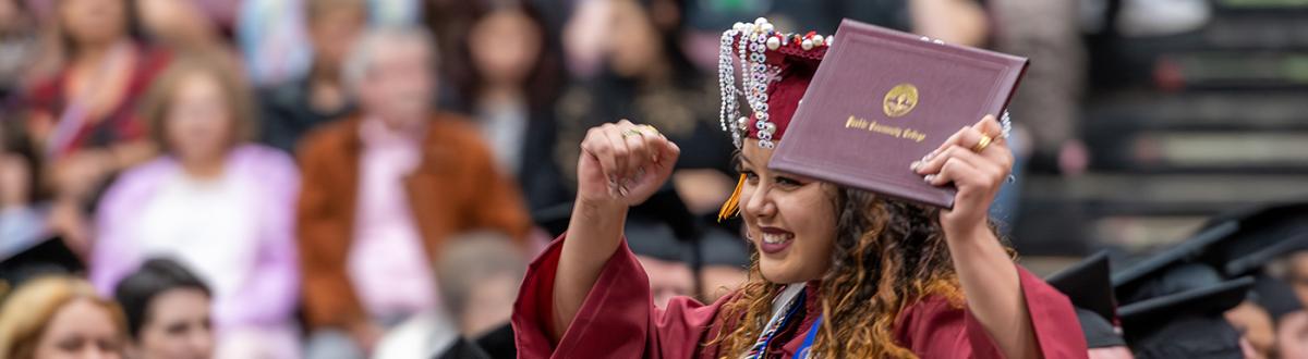 graduate celebrating
