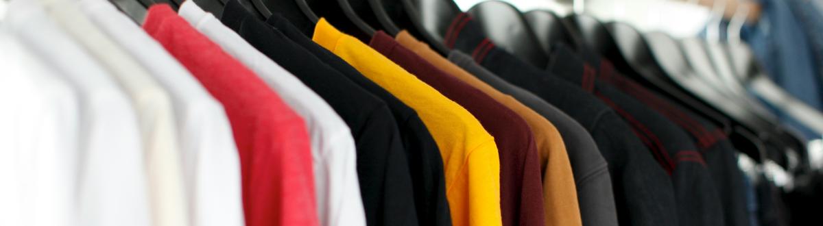 photo of clothes hanging on a rod