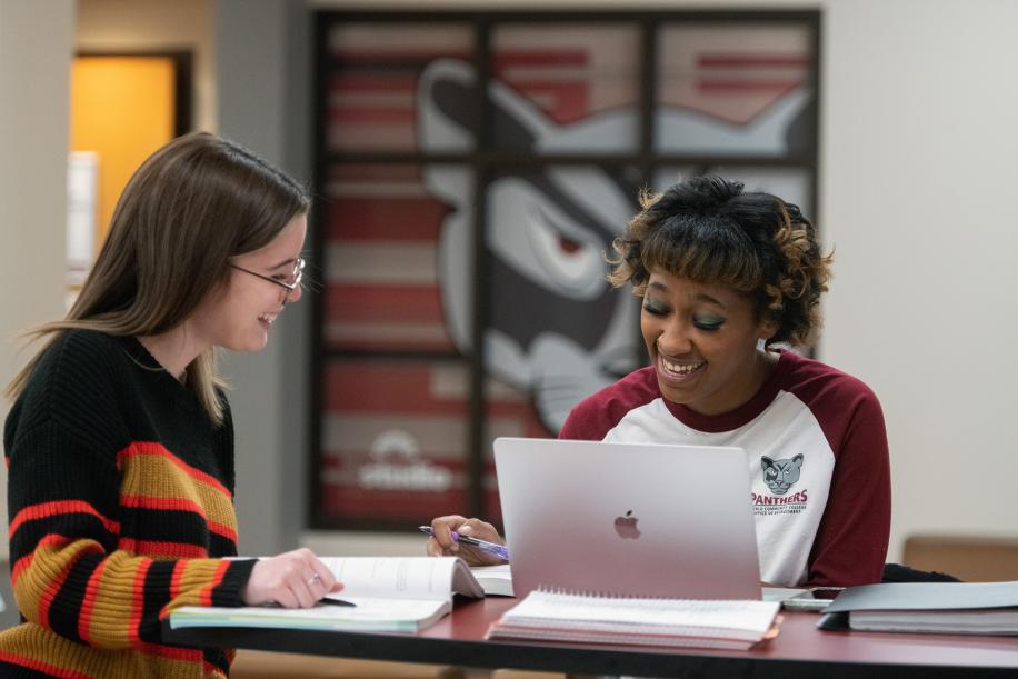 2 female student studying together