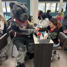 PCC Panther getting nails done