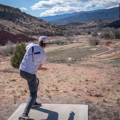 Player on the Fremont Campus Disc Golf Course