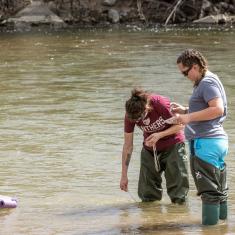 students taking water samples